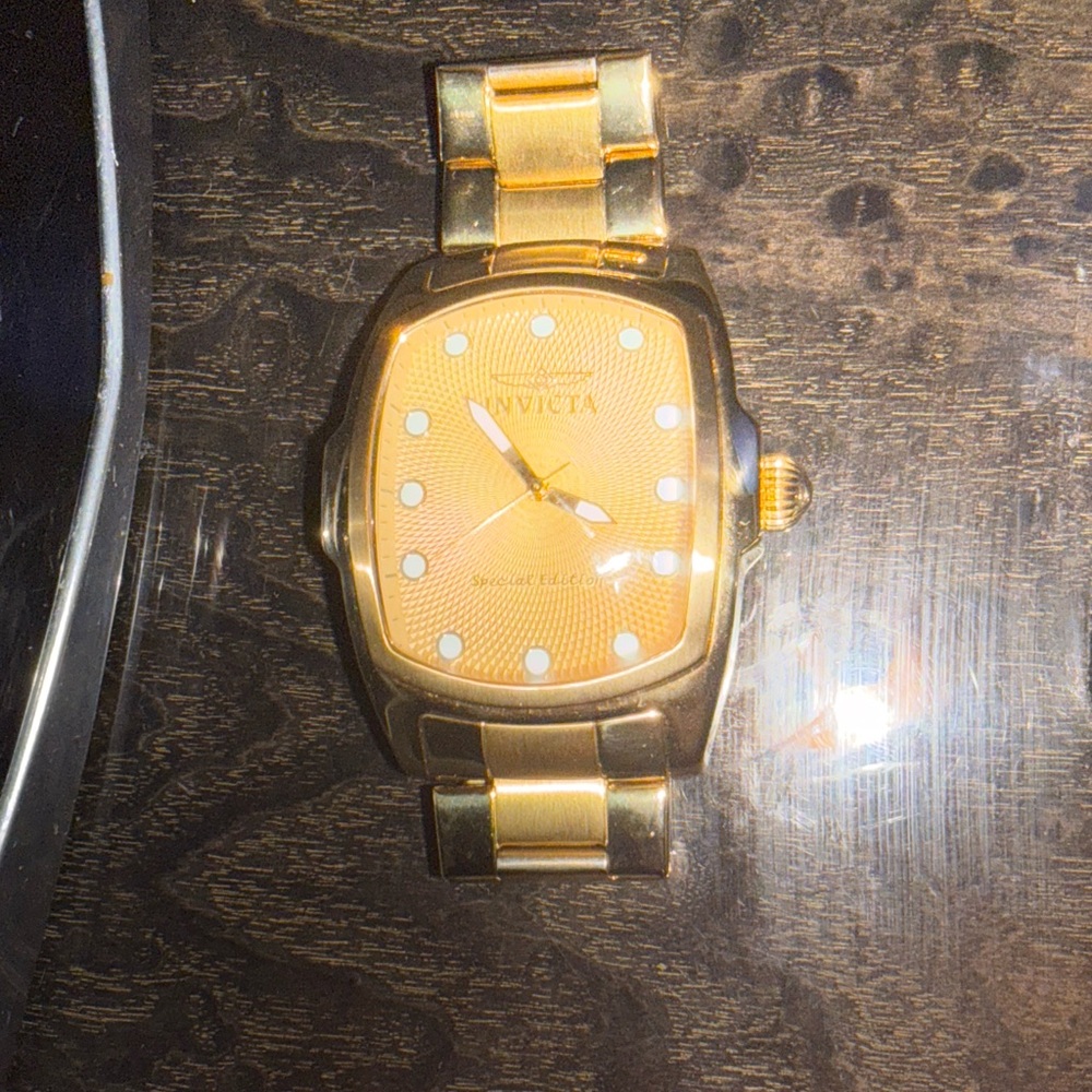 Invicta Gold-Tone Watch with White Accents